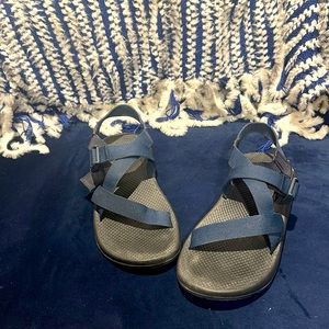 Navy blue lightly worn Chacos, in great condition.